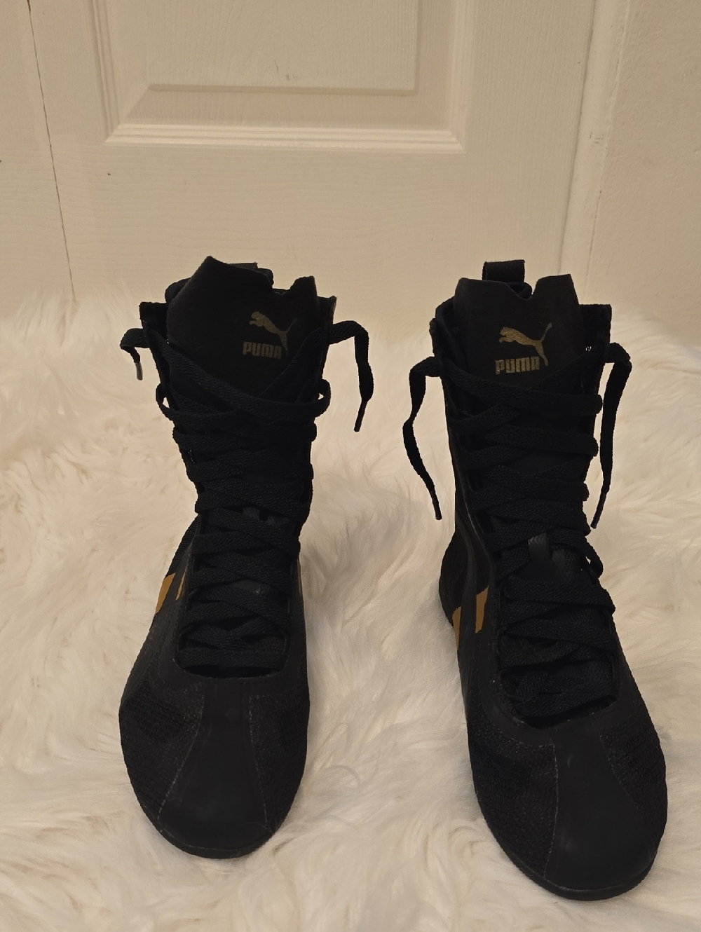 Puma Women’s Black Light High-Tops with Gold Logo